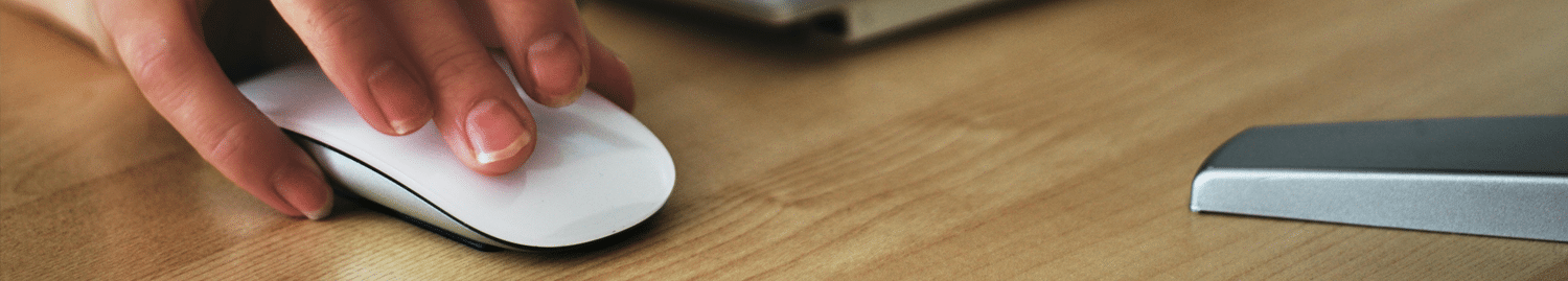 woman working with apple mouse hmrc